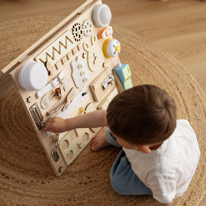 Oulesvte Busy Board per Bambini, Pannello Sensoriale Montessori 7 in 1 Oulesvte Busy Board per Bambini, Pannello Sensoriale Montessori 7 in 1